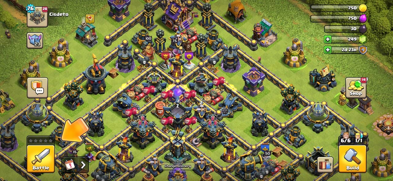 Clash of Clans yeni arayüzünde sol alttaki Battle butonu ve köy ekranı