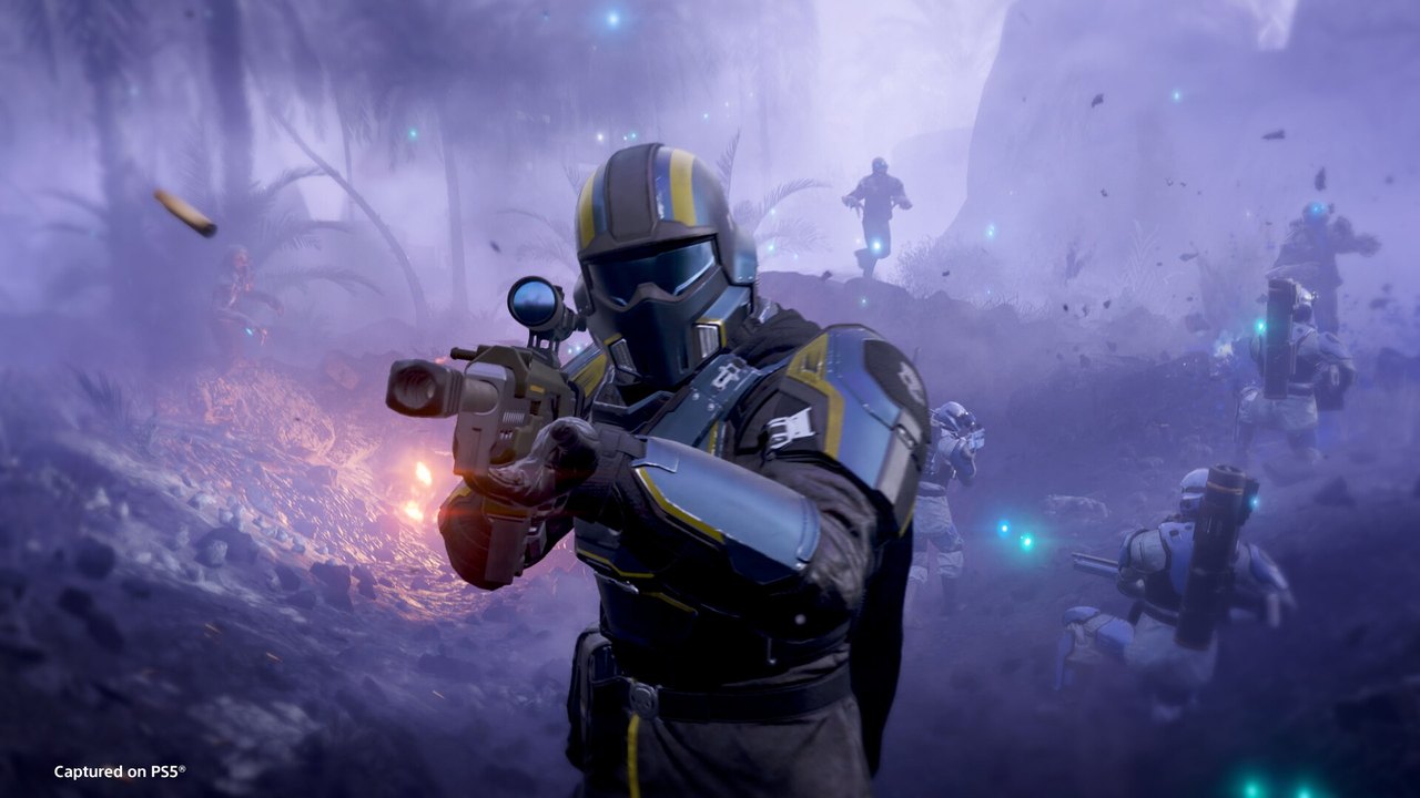 A Helldiver aiming a rifle in a purple-lit alien forest in Helldivers 2