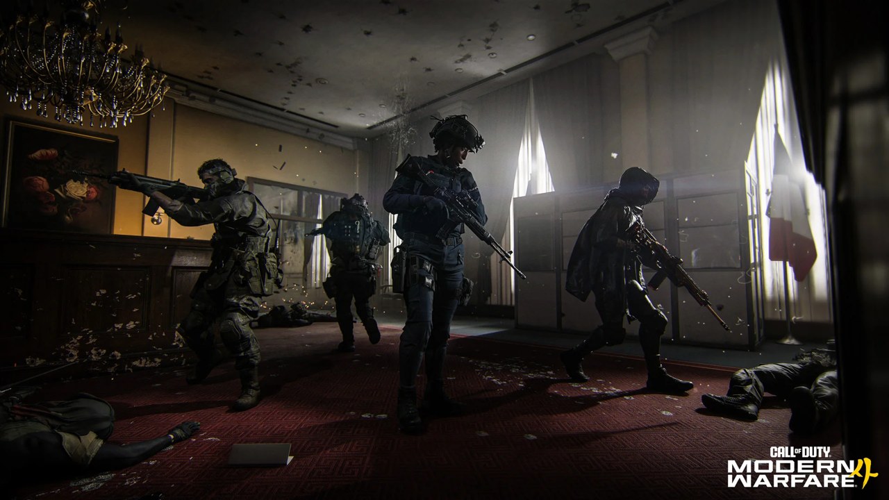A squad of soldiers moving down a dark corridor in Modern Warfare 4