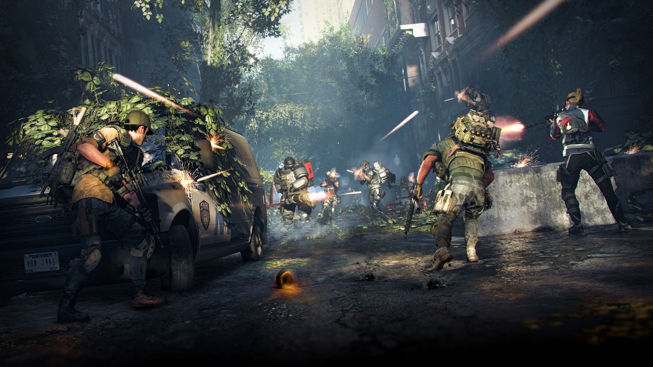 The Division 2 Echoes of Central Park DLC'sinde yıkık bir sokakta düşmanlarla çatışan ajanlar