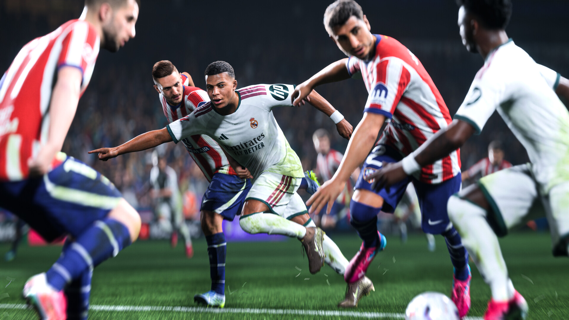 FC 27'de Real Madrid ve Atlético Madrid oyuncularının top mücadelesi